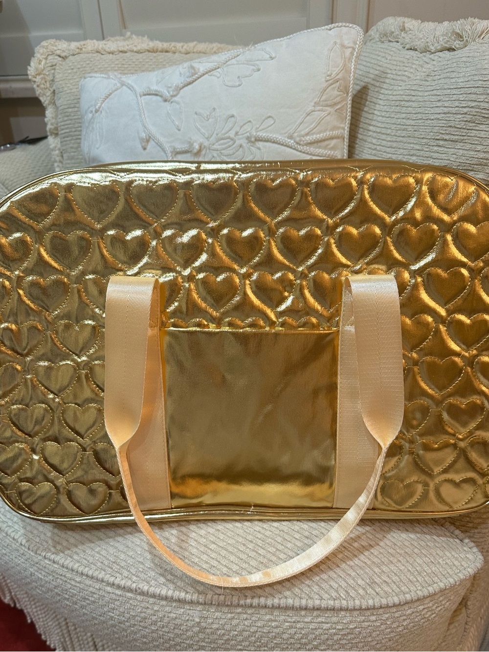 Olivia miller gold embossed heart motif tote bag.